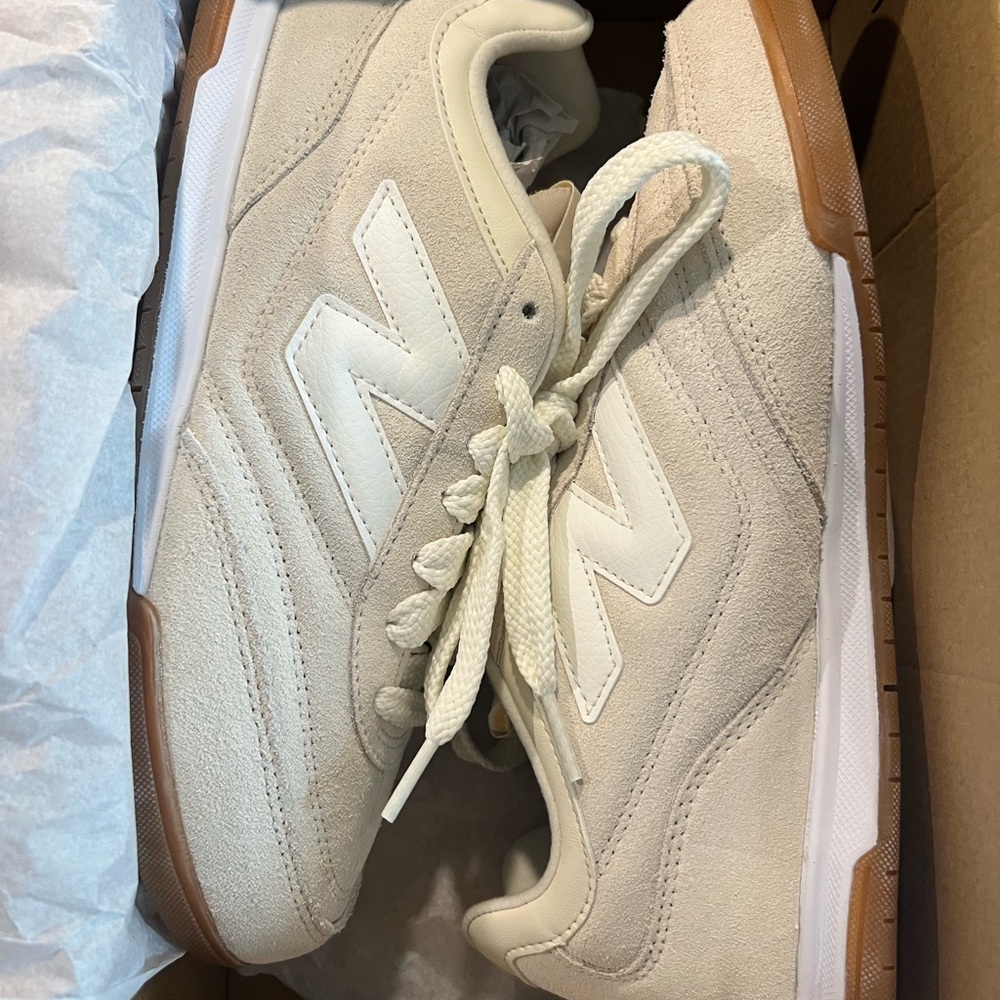 New Balance Women’s Cream and White Sneakers